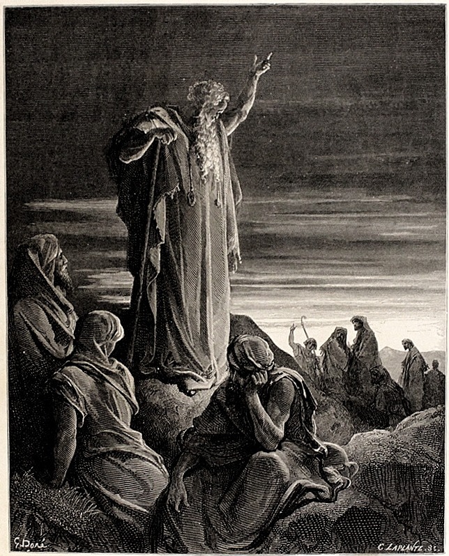 A bearded prophet stands on a rock with his arm raised, speaking, while the people seated around him look down and away