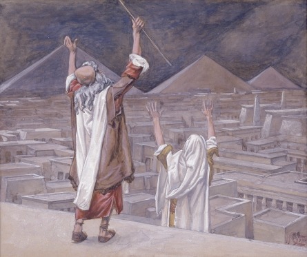 The Day Of The Lord - Moses with his rod raised over an Egyptian city under a darkened sky as the locusts come, in James Tissot’s painting