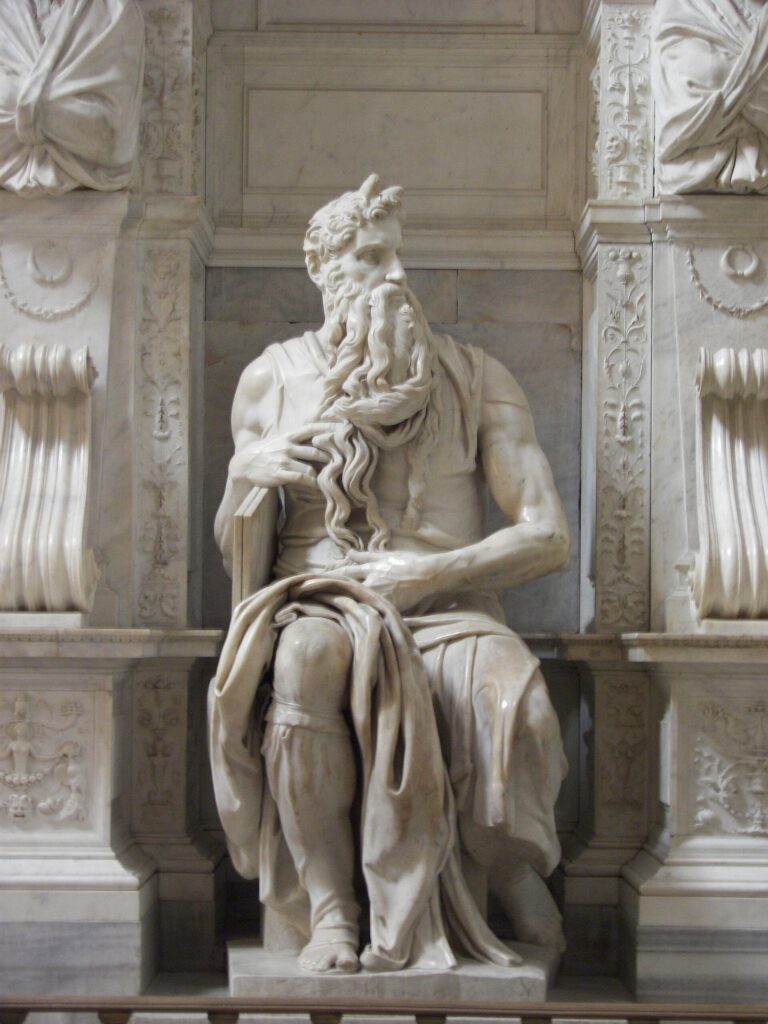 Michelangelo's marble sculpture of Moses, with rays of light on his head