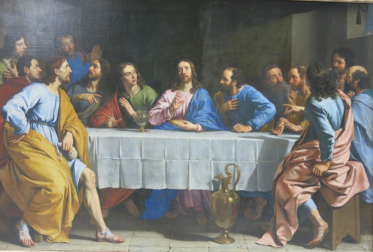 Baptism And Communion: Now I Belong To Jesus 2 Jesus sits at the center of a long table covered with a white cloth, holding the bread and looking up to heaven, while the twelve disciples lean in around Him and a golden pitcher stands on the floor