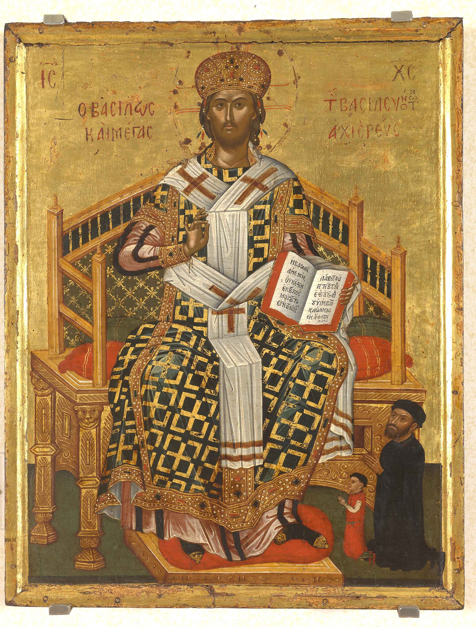 Hebrews 2 A Cretan icon of Christ enthroned on a golden throne in the vestments of a high priest, wearing a crown, blessing with one hand and holding an open book in the other