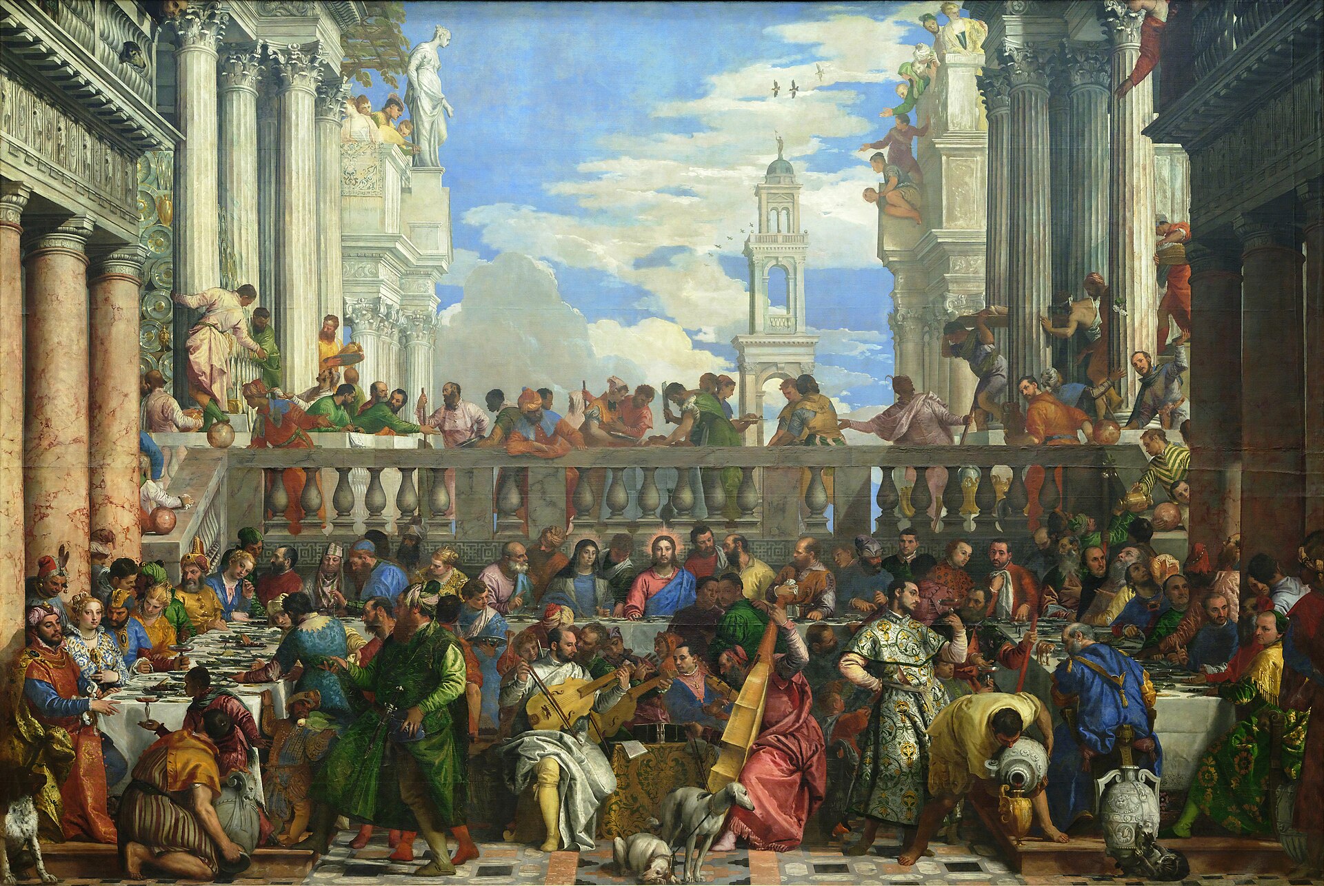 A vast wedding banquet on a marble terrace beneath classical columns and a blue sky, with Jesus seated at the center of the long table among the guests, musicians playing in the foreground and servants pouring wine