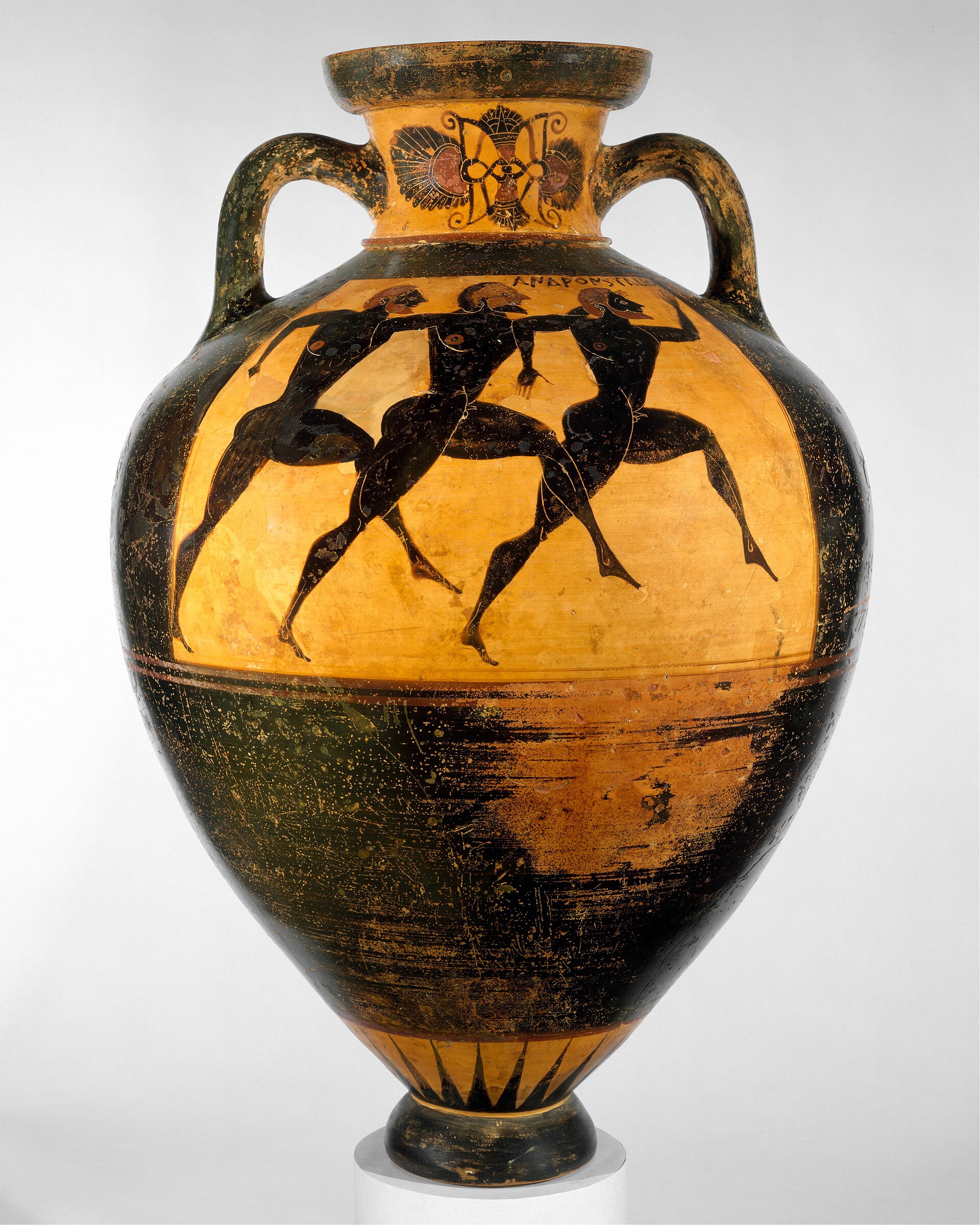 I Press Toward The Mark 1 A black-figure Greek prize amphora showing three runners straining in a footrace