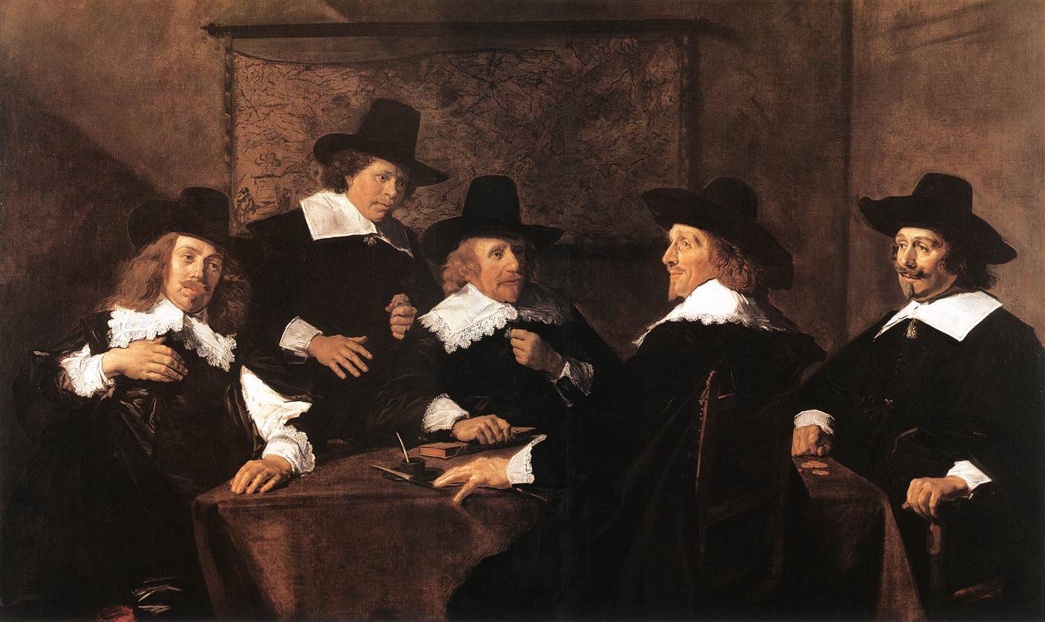 Five soberly dressed Dutch regents in black with white collars seated around a table with a ledger and quill, a map on the wall behind them